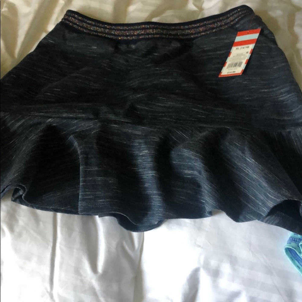 Girls navy skirt.  New